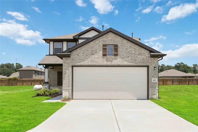a front view of house with yard