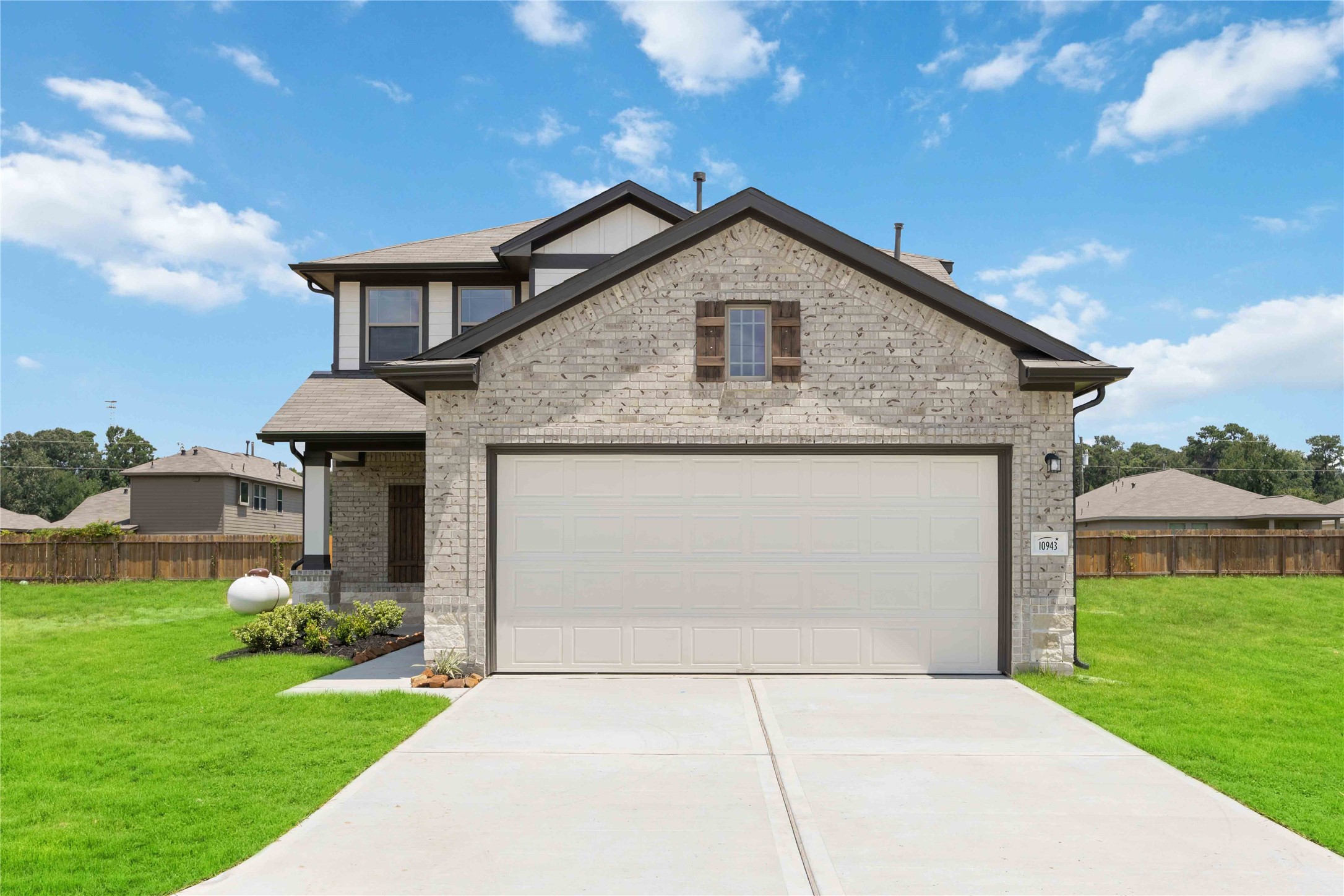 10943 Independence Road Cleveland, TX 77328 - Photo 2 of 31 a front view of house with yard