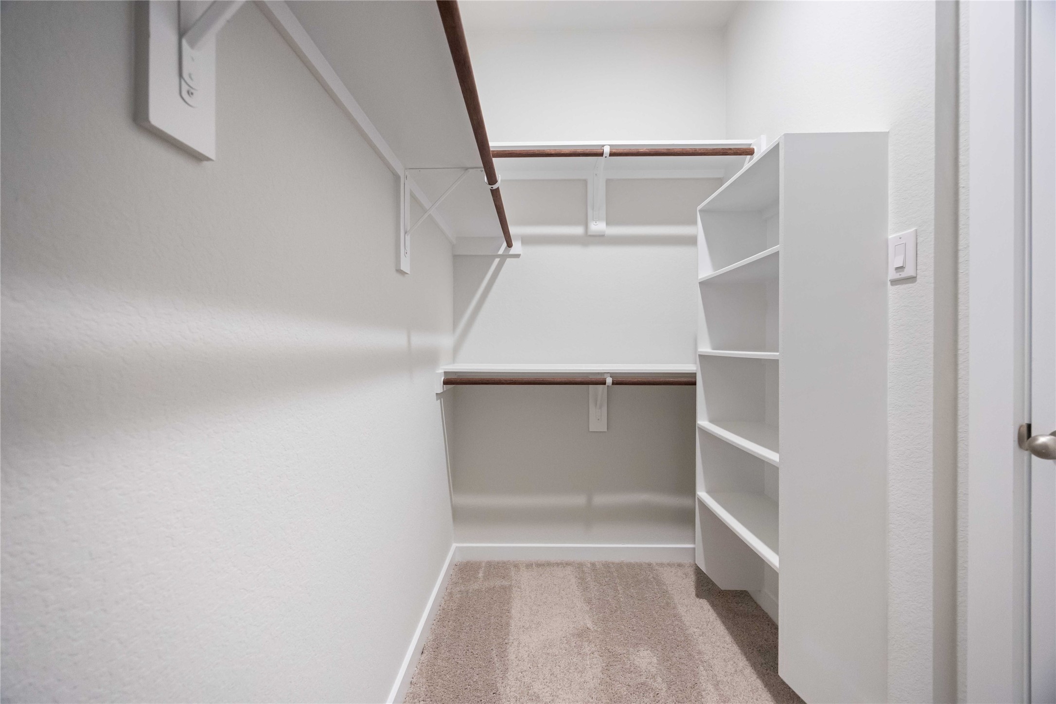 10943 Independence Road Cleveland, TX 77328 - Photo 21 of 31 a view of an empty walk in closet