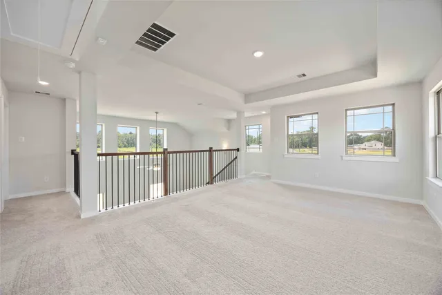 en view interior of a house with wooden floor and windows