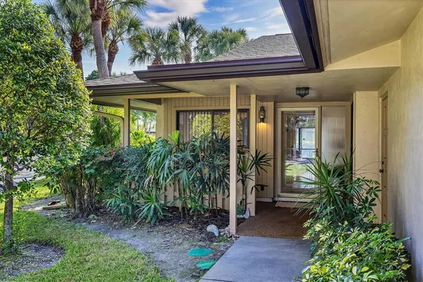 a view of a house with a small porch