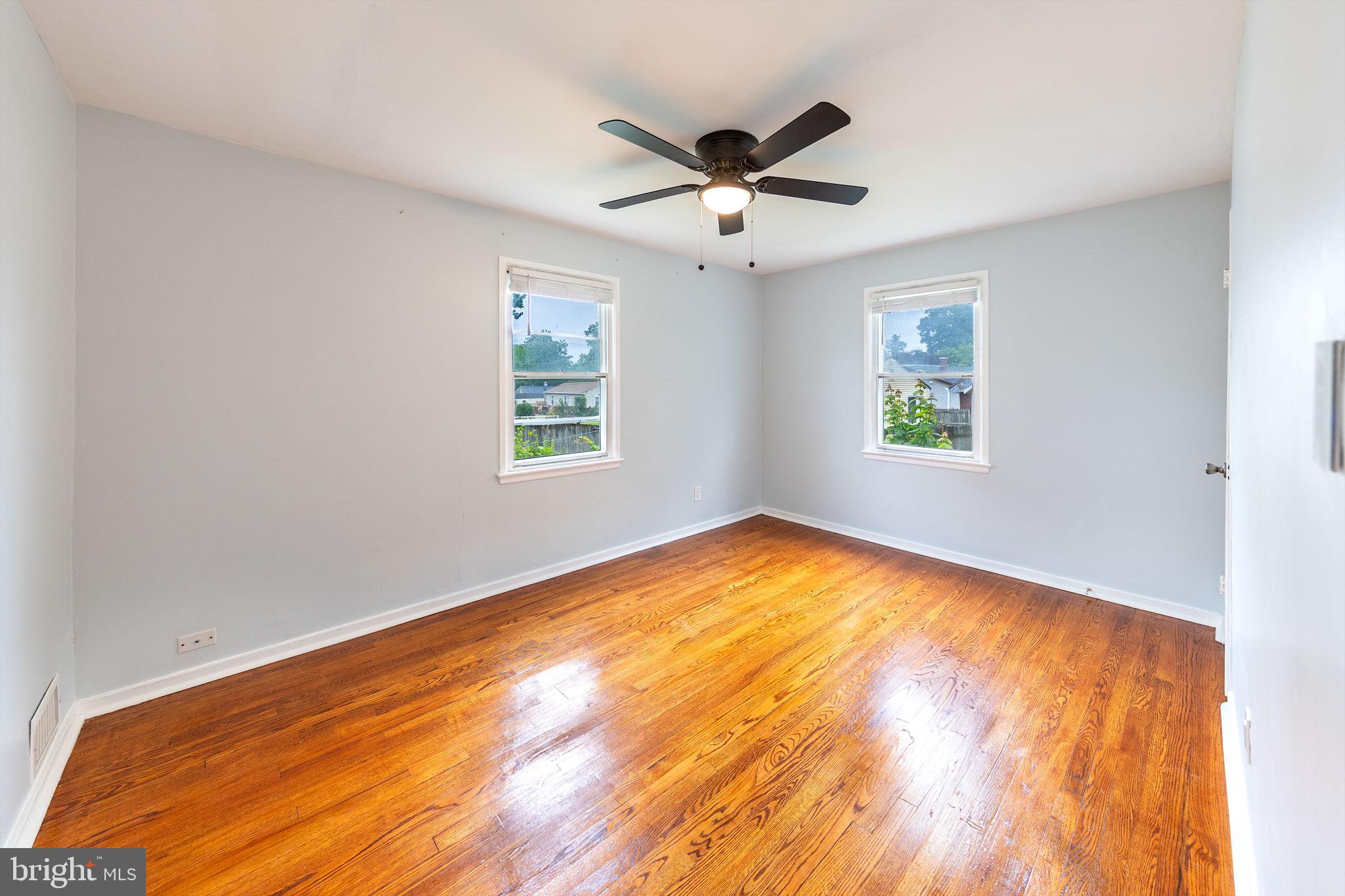 3321 Clay Street Silver Spring, MD 20902 - Photo 14 of 41 a view of empty room with wooden floor and fan