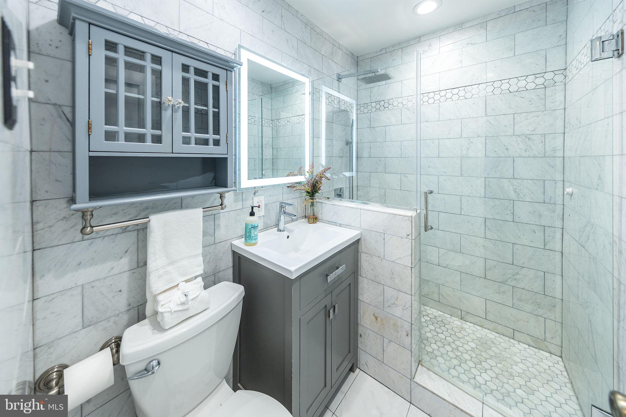 3321 Clay Street Silver Spring, MD 20902 - Photo 19 of 41 a bathroom with a sink toilet and shower
