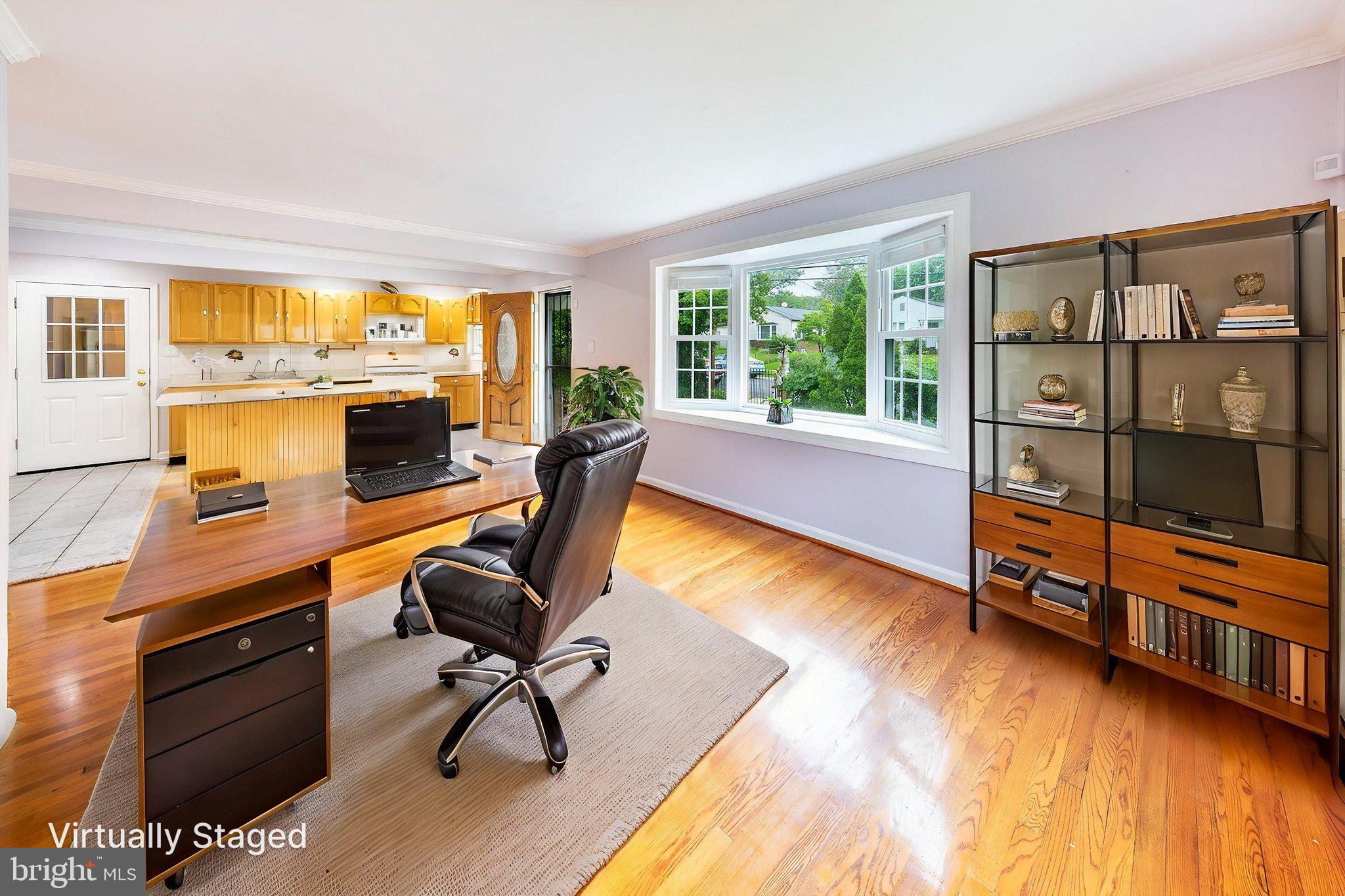 3321 Clay Street Silver Spring, MD 20902 - Photo 3 of 41 a view of a workspace with furniture and a window
