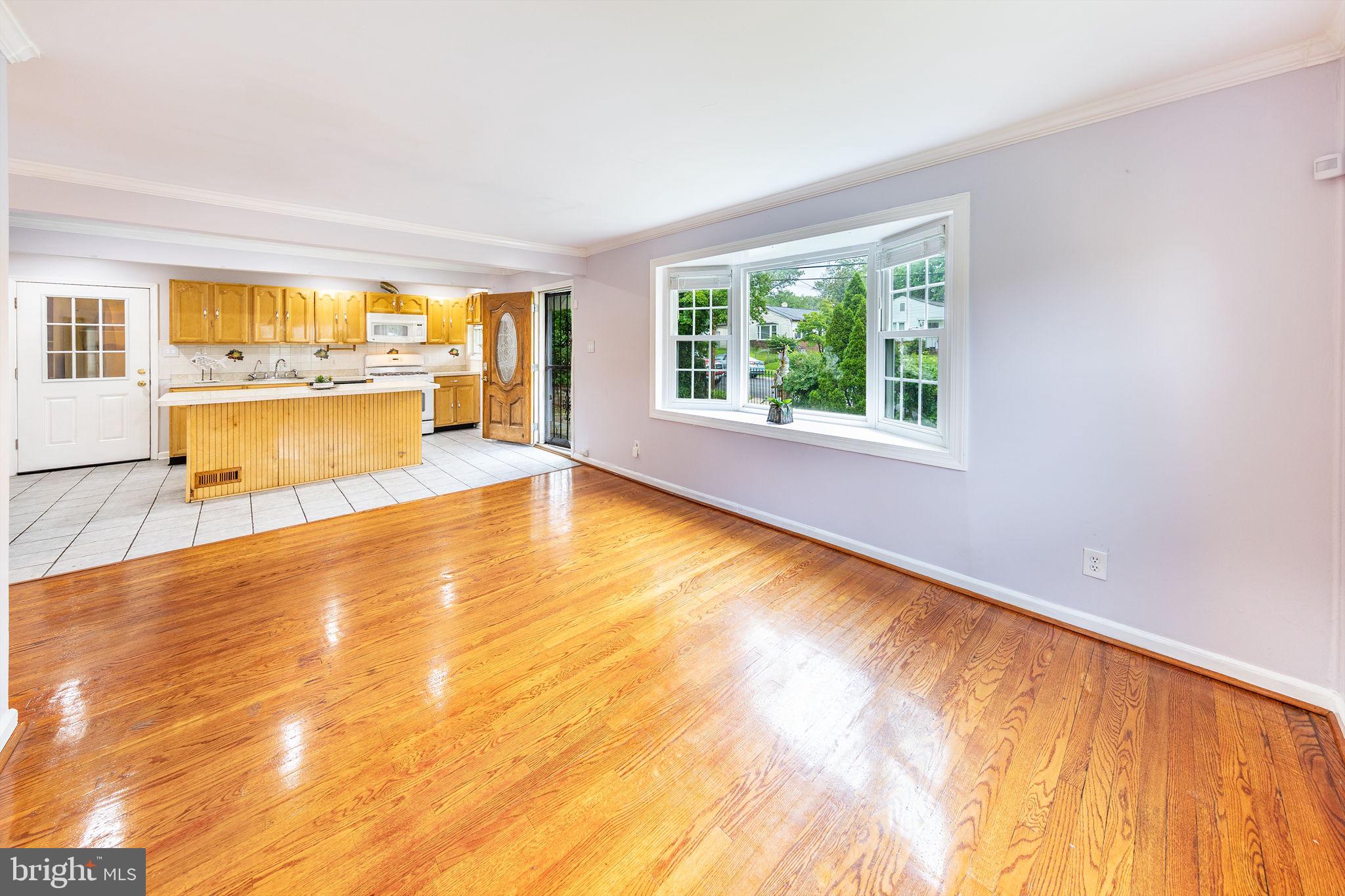 3321 Clay Street Silver Spring, MD 20902 - Photo 41 of 41 a view of an empty room with wooden floor and a window