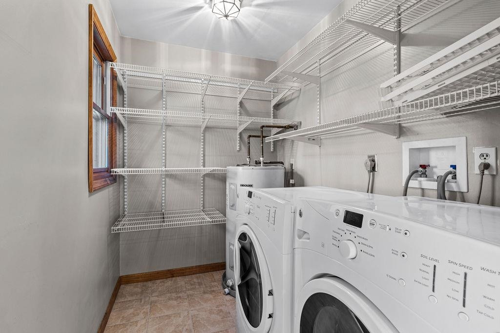 8933 Barker Road New Hill, NC 27562 - Photo 12 of 30 Laundry Room with Lots of Shelving for Added Storage