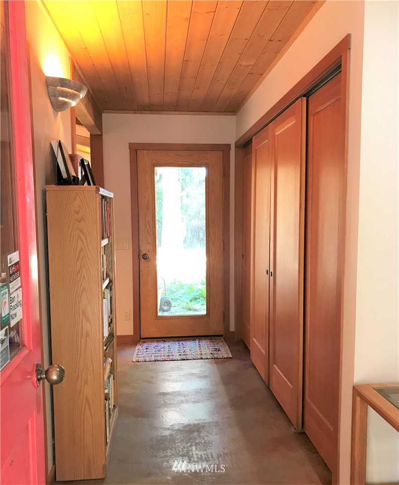 53 Cross Road Lopez Island, WA 98261 - Photo 13 of 20 a view of a hallway with windows
