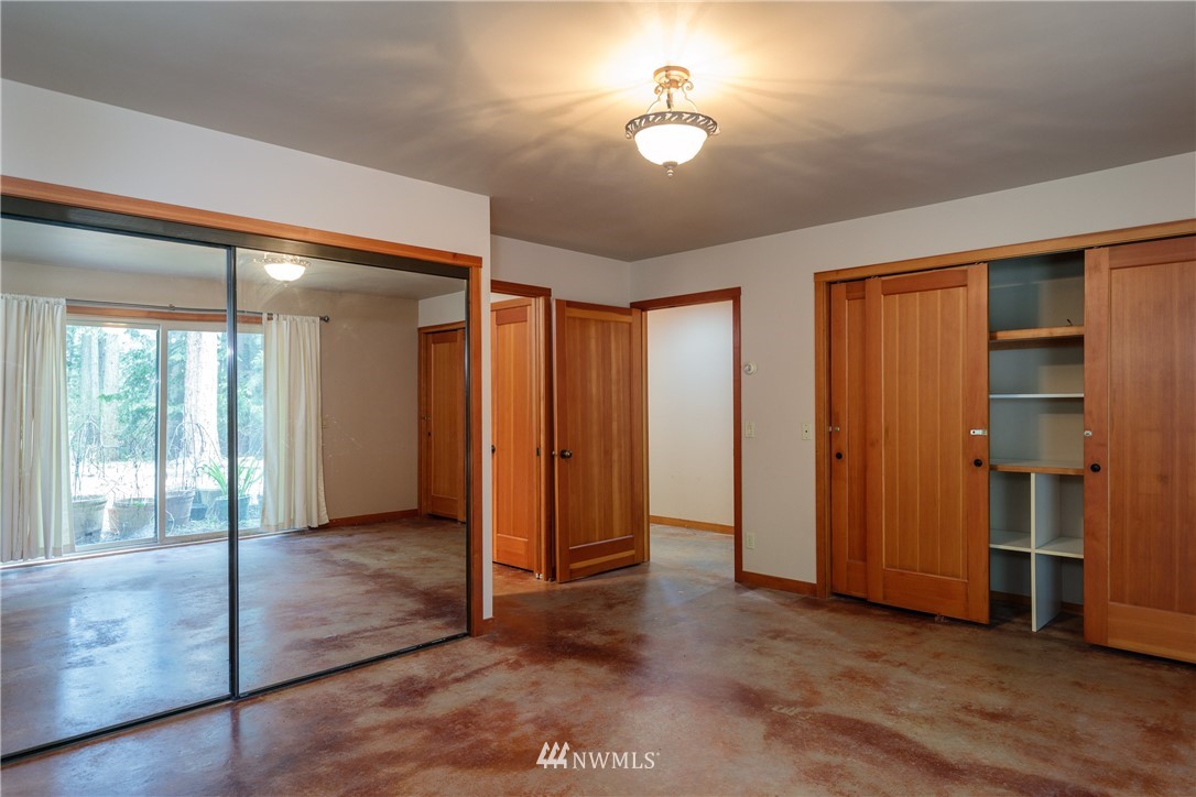 53 Cross Road Lopez Island, WA 98261 - Photo 16 of 20 wooden floor in an empty room with a window