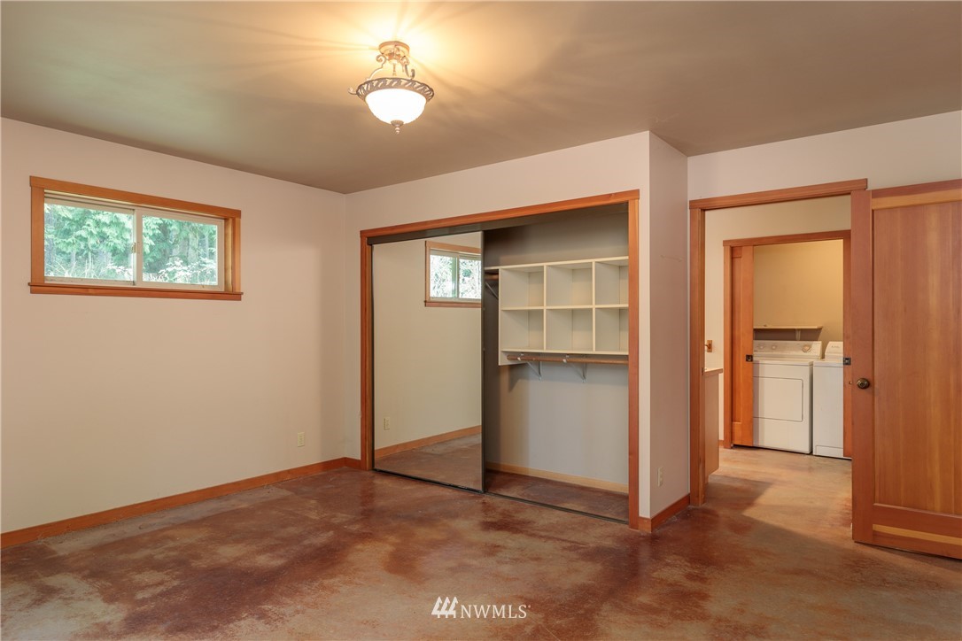 53 Cross Road Lopez Island, WA 98261 - Photo 17 of 20 an empty room with closet and windows