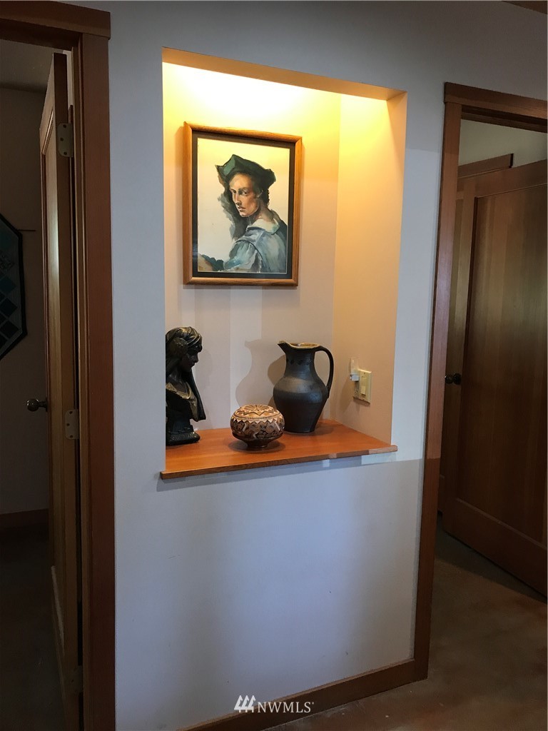 53 Cross Road Lopez Island, WA 98261 - Photo 20 of 20 a room with wooden door and glass windows