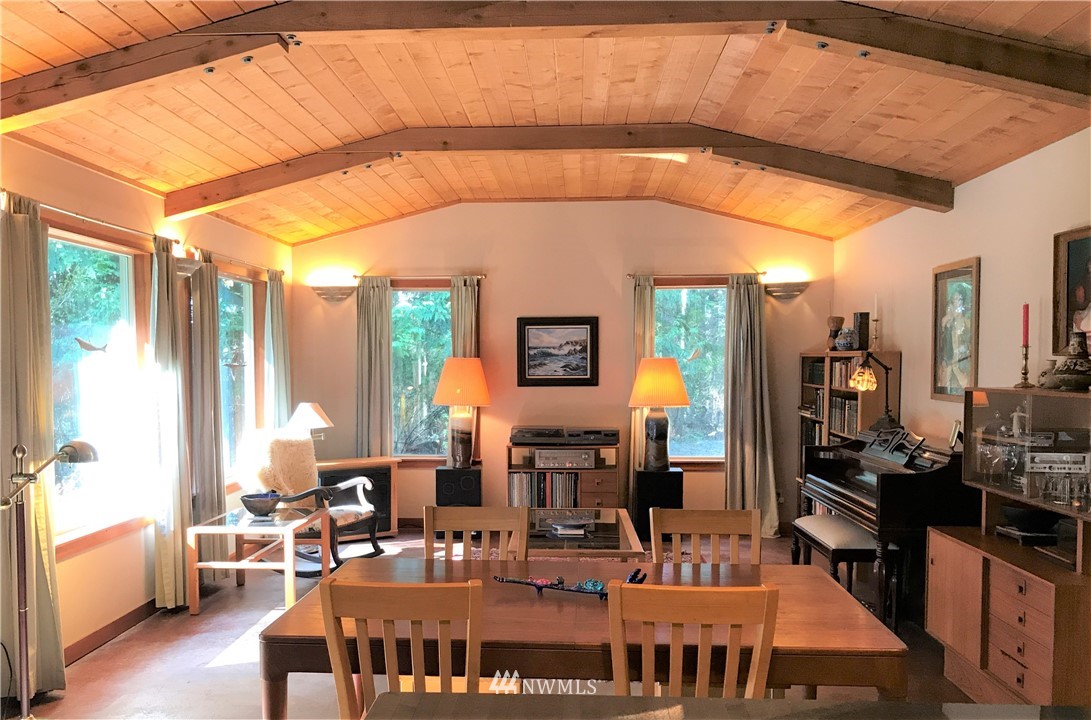 53 Cross Road Lopez Island, WA 98261 - Photo 3 of 20 a outdoor space with lots of furniture and chandelier