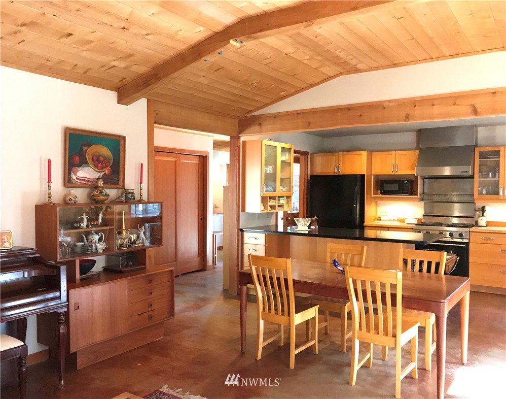53 Cross Road Lopez Island, WA 98261 - Photo 9 of 20 a view of a dining room with furniture