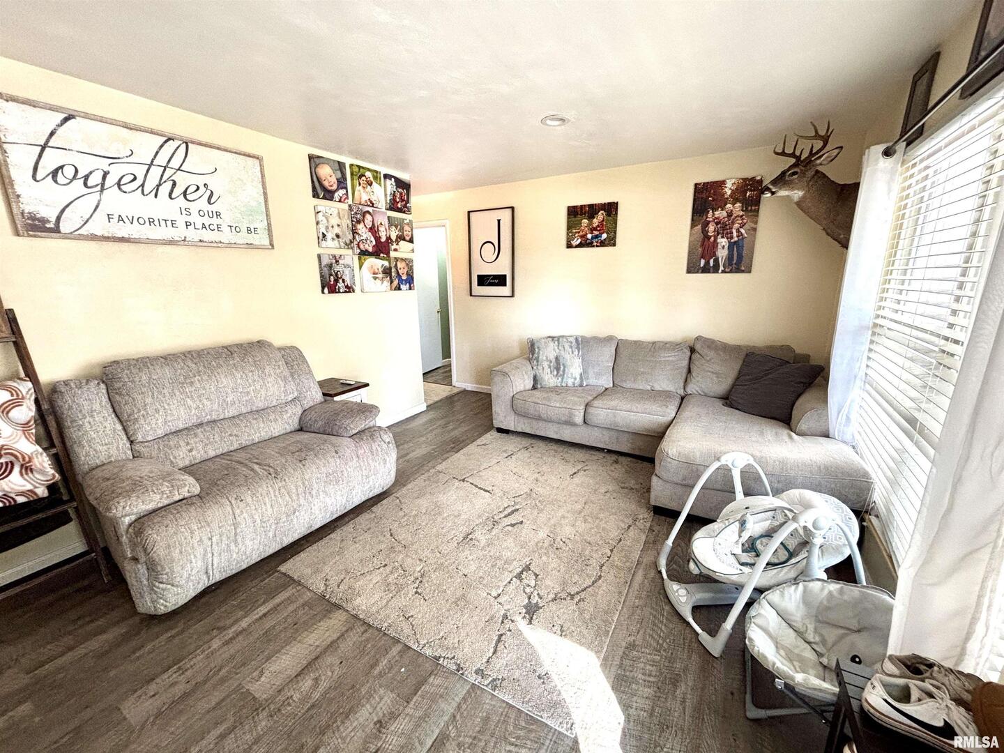1012 West 4th Street Centralia, IL 62801 - Photo 5 of 20 a living room with furniture and wooden floor