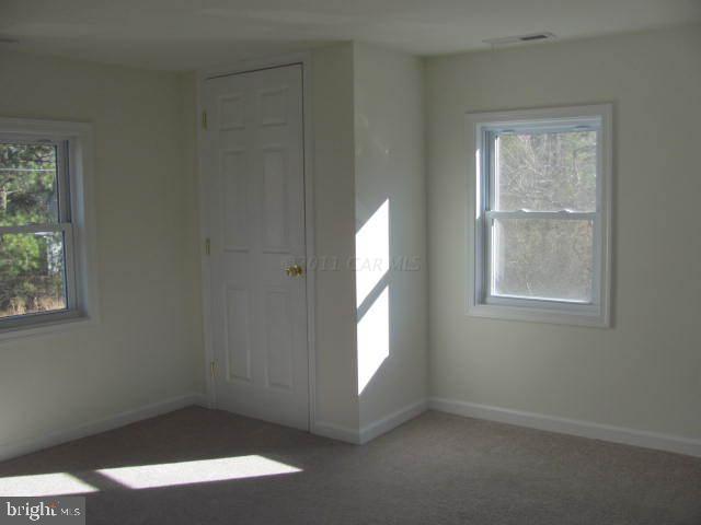 9920 Champ Road Princess Anne, MD 21853 - Photo 11 of 12 an empty room with windows