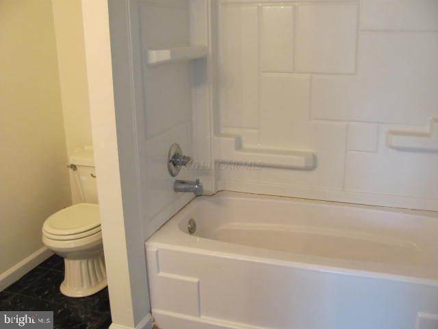 9920 Champ Road Princess Anne, MD 21853 - Photo 7 of 12 a bathroom with a sink and a toilet