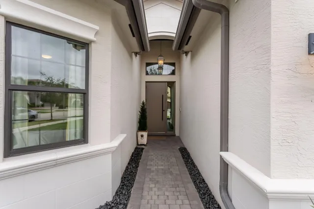 a view of hallway with washer and dryer