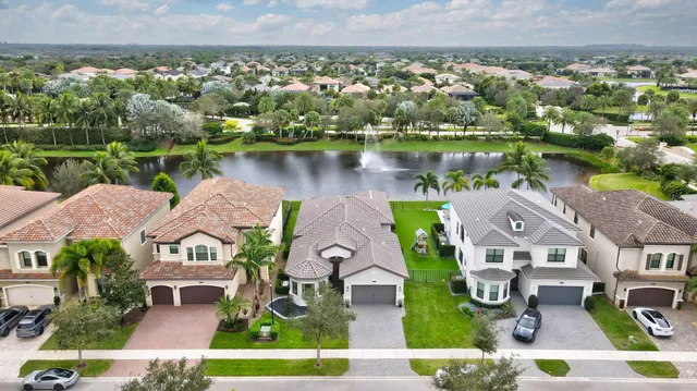 an aerial view of a house with a garden