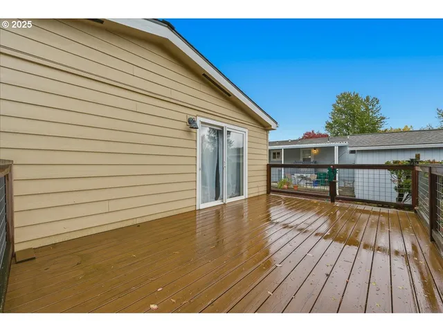 a view of backyard with wooden floor
