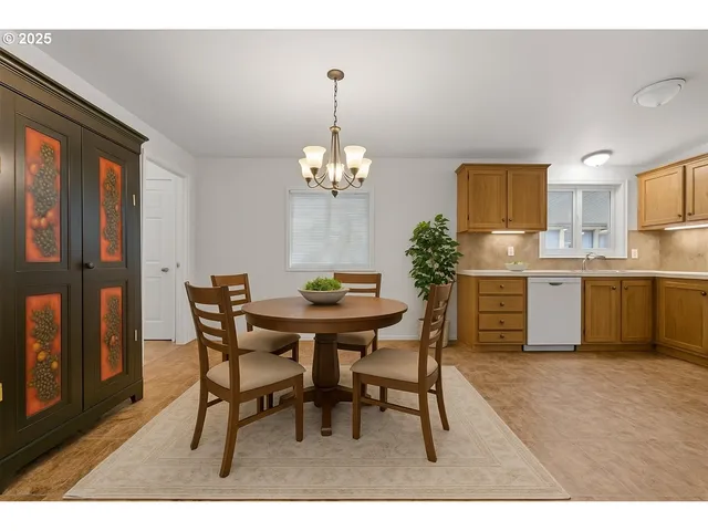 a dining room with furniture and window
