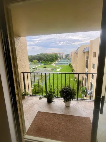 a view of a balcony with lake view