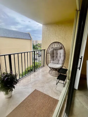 a living room with a balcony