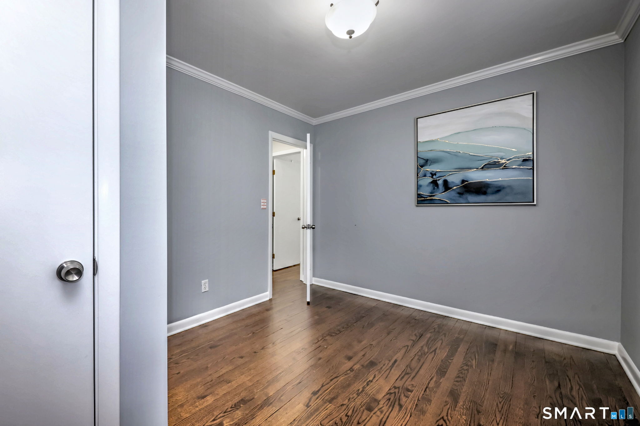 40 Yale Street Stratford, CT 06615 - Photo 19 of 31 a view of a hallway with wooden floor