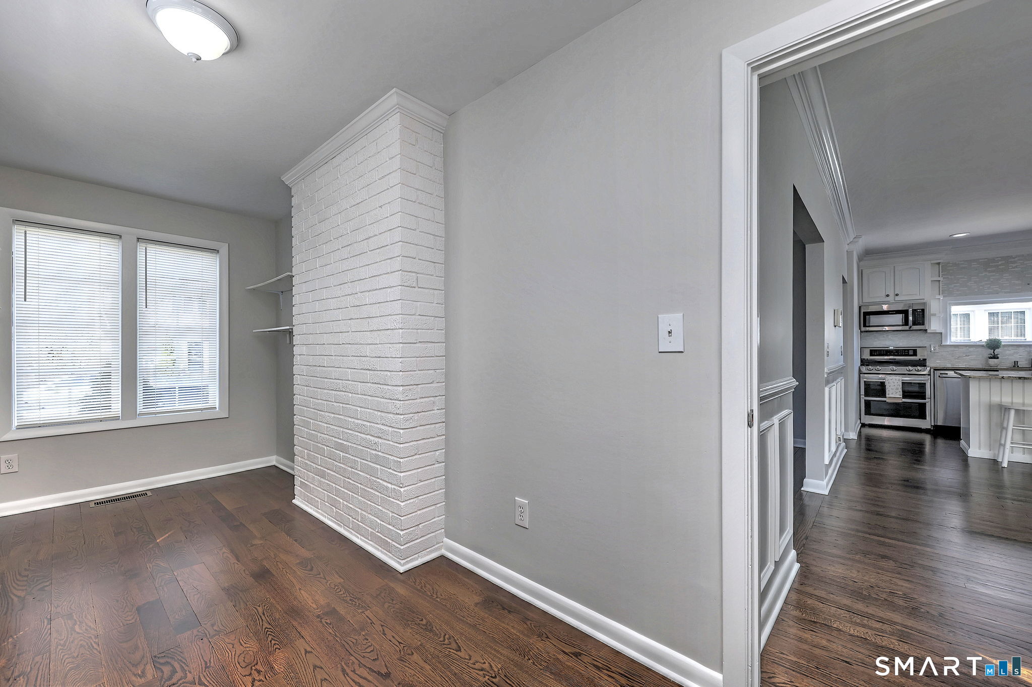 40 Yale Street Stratford, CT 06615 - Photo 24 of 31 an empty room with wooden floor and windows