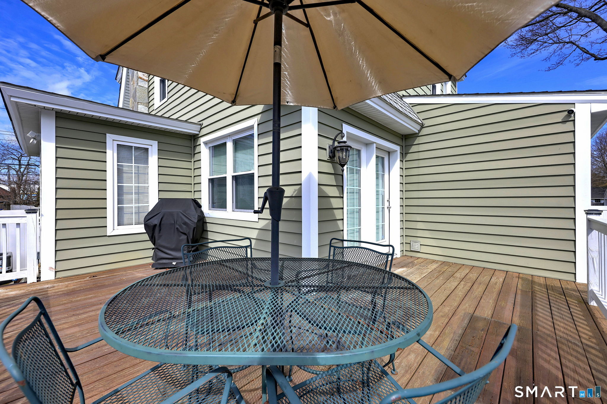 40 Yale Street Stratford, CT 06615 - Photo 25 of 31 a table and chairs in patio of the house