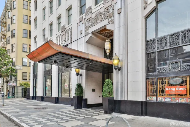 a front view of a building with a porch