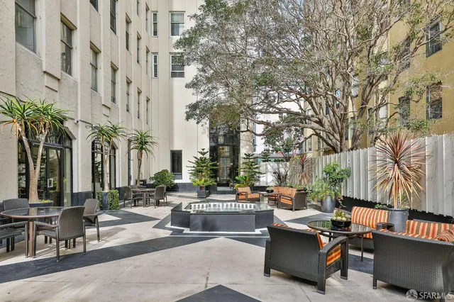 a building exterior with furniture