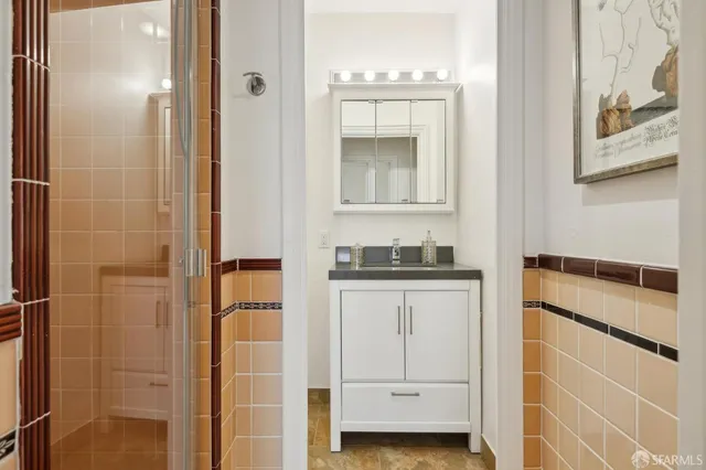 a bathroom with a sink and a mirror