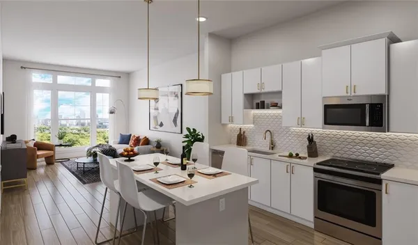 a kitchen with a sink stove and refrigerator