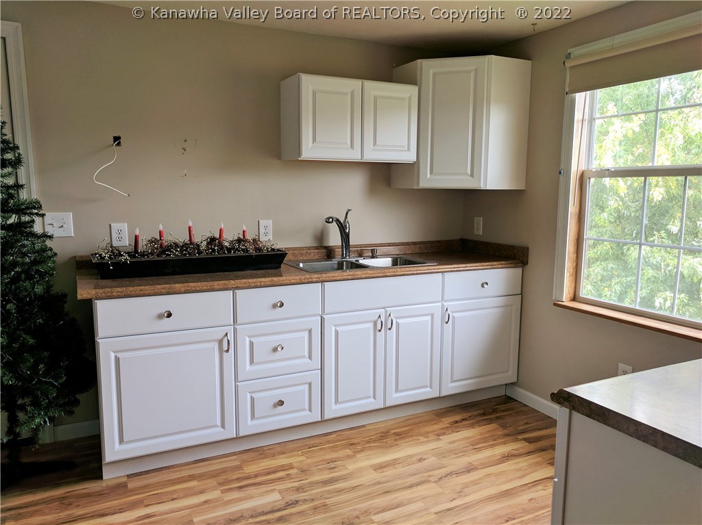 10090 Redmond Ridge Road Gallipolis Ferry, WV 25515 - Photo 22 of 30 Additional Kitchenette with Door to Back Yard