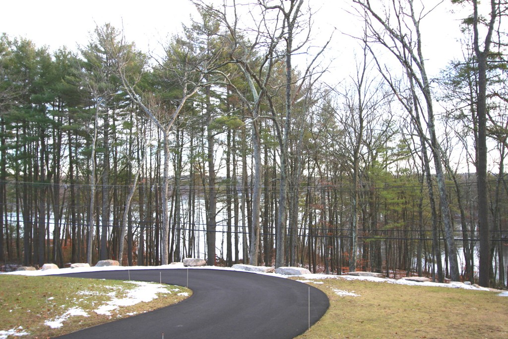 56 Spring Street Hopkinton, MA 01748 - Photo 29 of 30 a view of swimming pool with a backyard