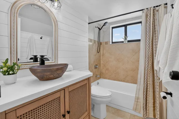 a view of a room with balcony and furniture