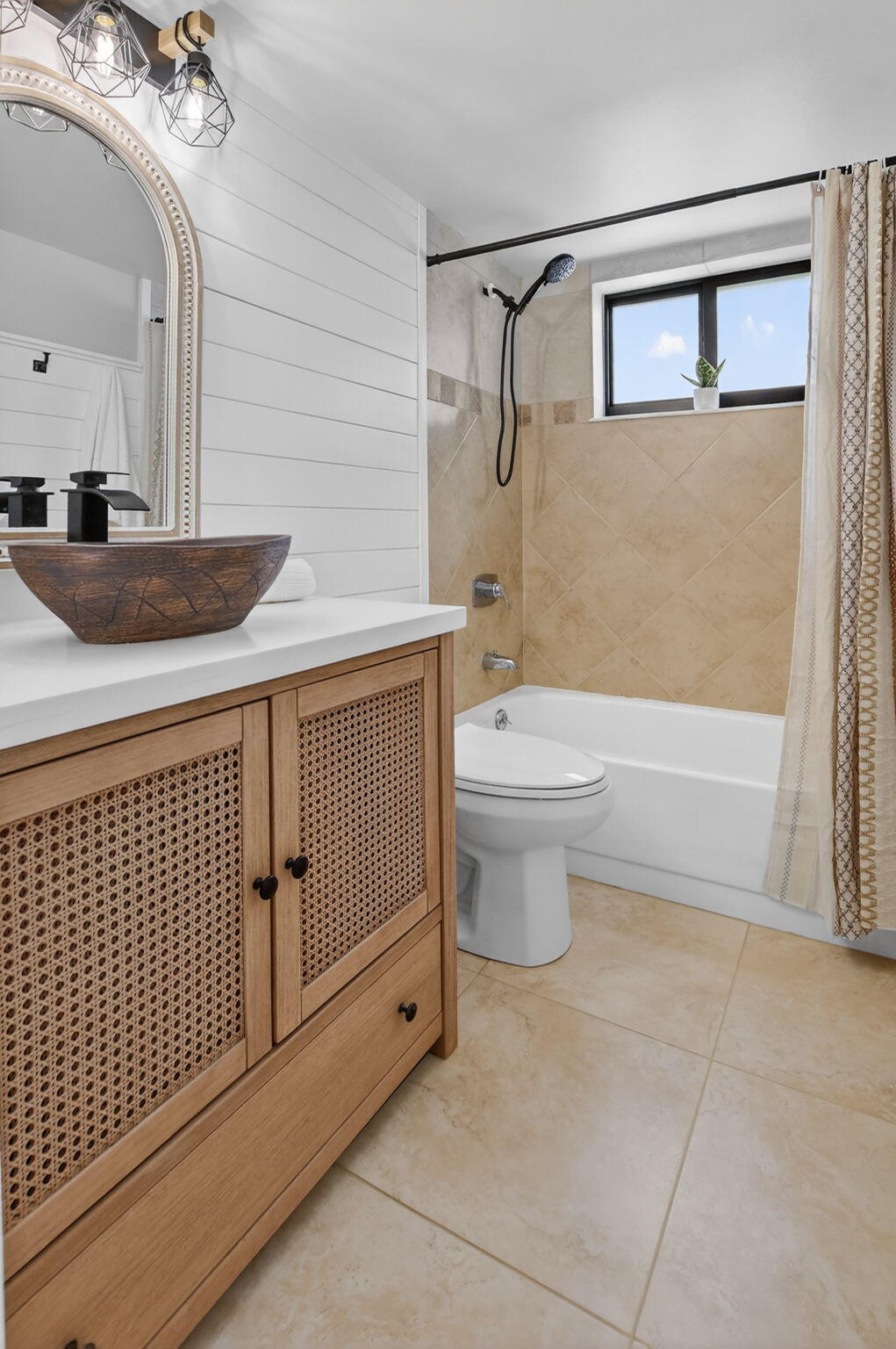 918 Southwest 9th St Circle, Unit 105 Boca Raton, FL 33486 - Photo 22 of 39 a bathroom with a toilet a sink and shower