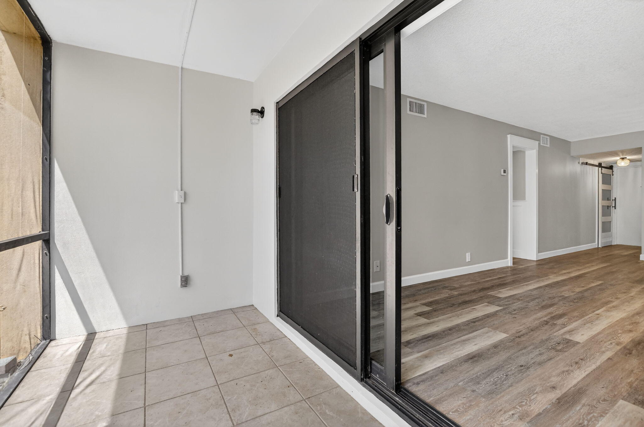 918 Southwest 9th St Circle, Unit 105 Boca Raton, FL 33486 - Photo 23 of 39 a view of an empty room