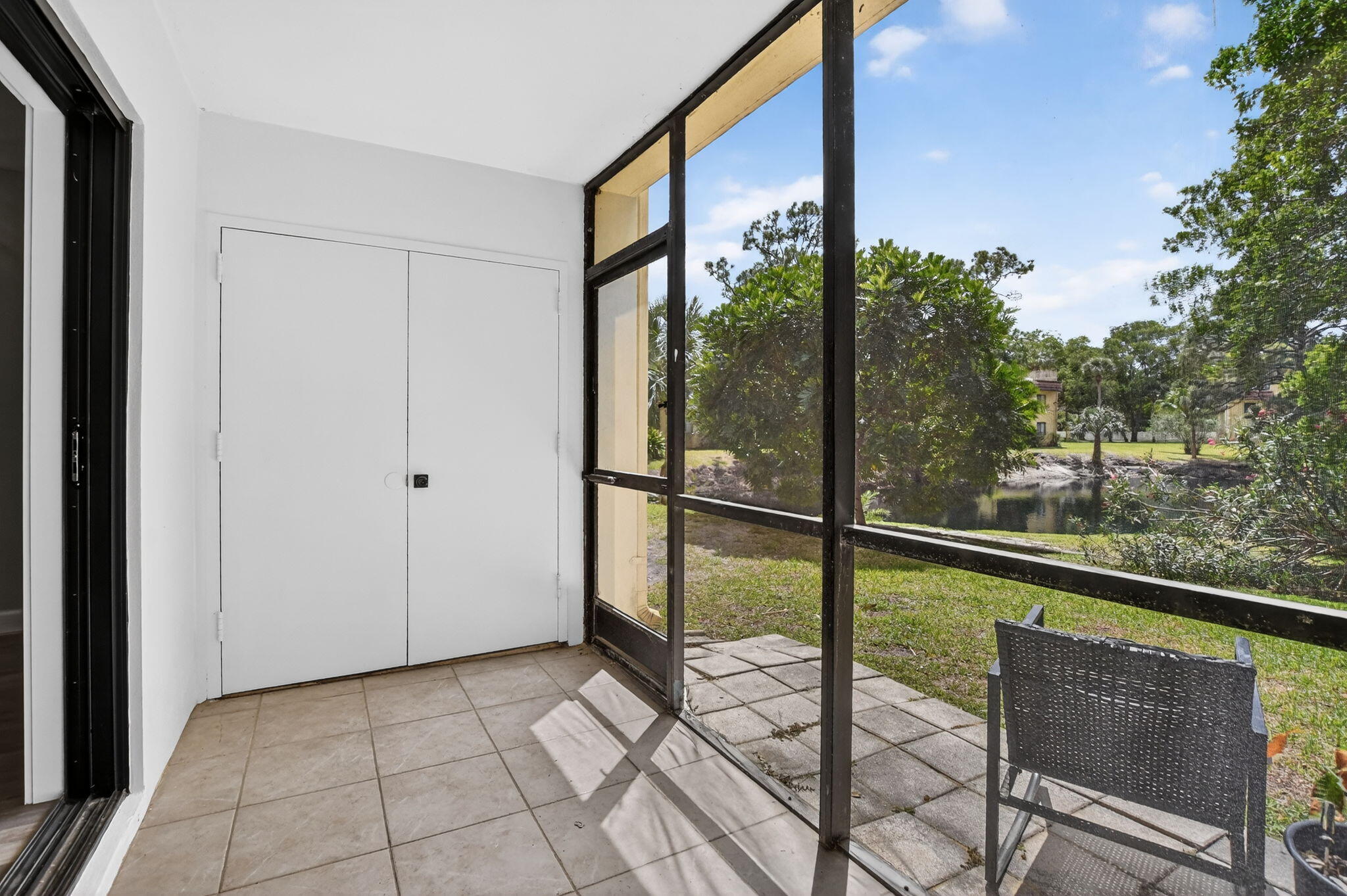 918 Southwest 9th St Circle, Unit 105 Boca Raton, FL 33486 - Photo 24 of 39 a view of a room with balcony and furniture