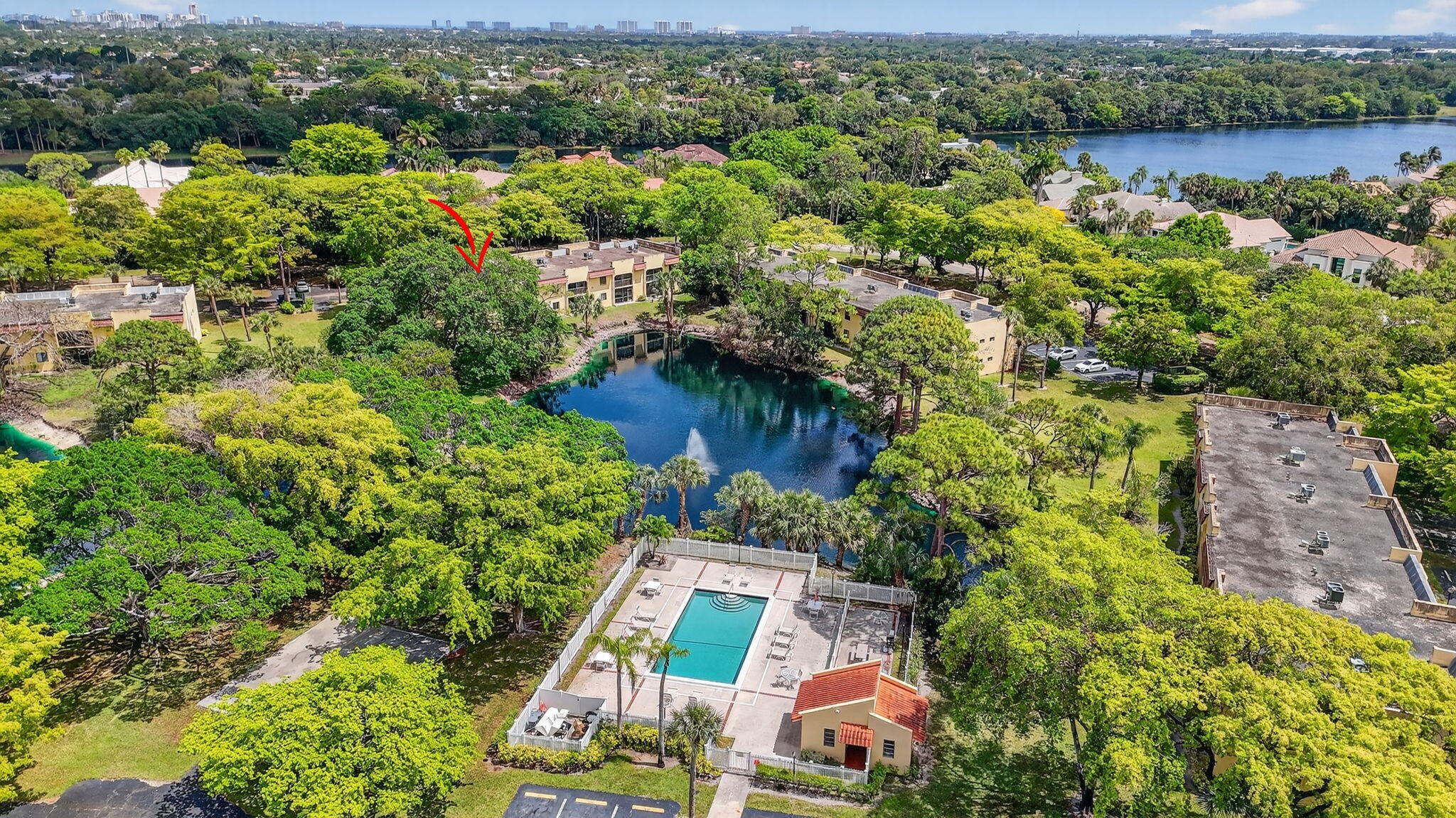 918 Southwest 9th St Circle, Unit 105 Boca Raton, FL 33486 - Photo 30 of 39 an aerial view of a house with a lake view
