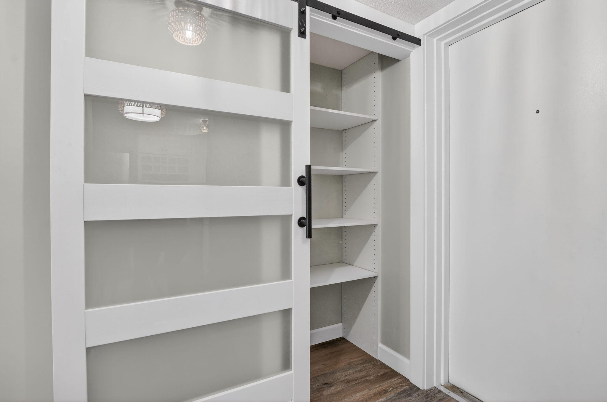 918 Southwest 9th St Circle, Unit 105 Boca Raton, FL 33486 - Photo 3 of 39 a hallway with closet