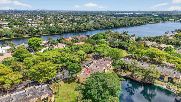 a view of swimming pool with a yard