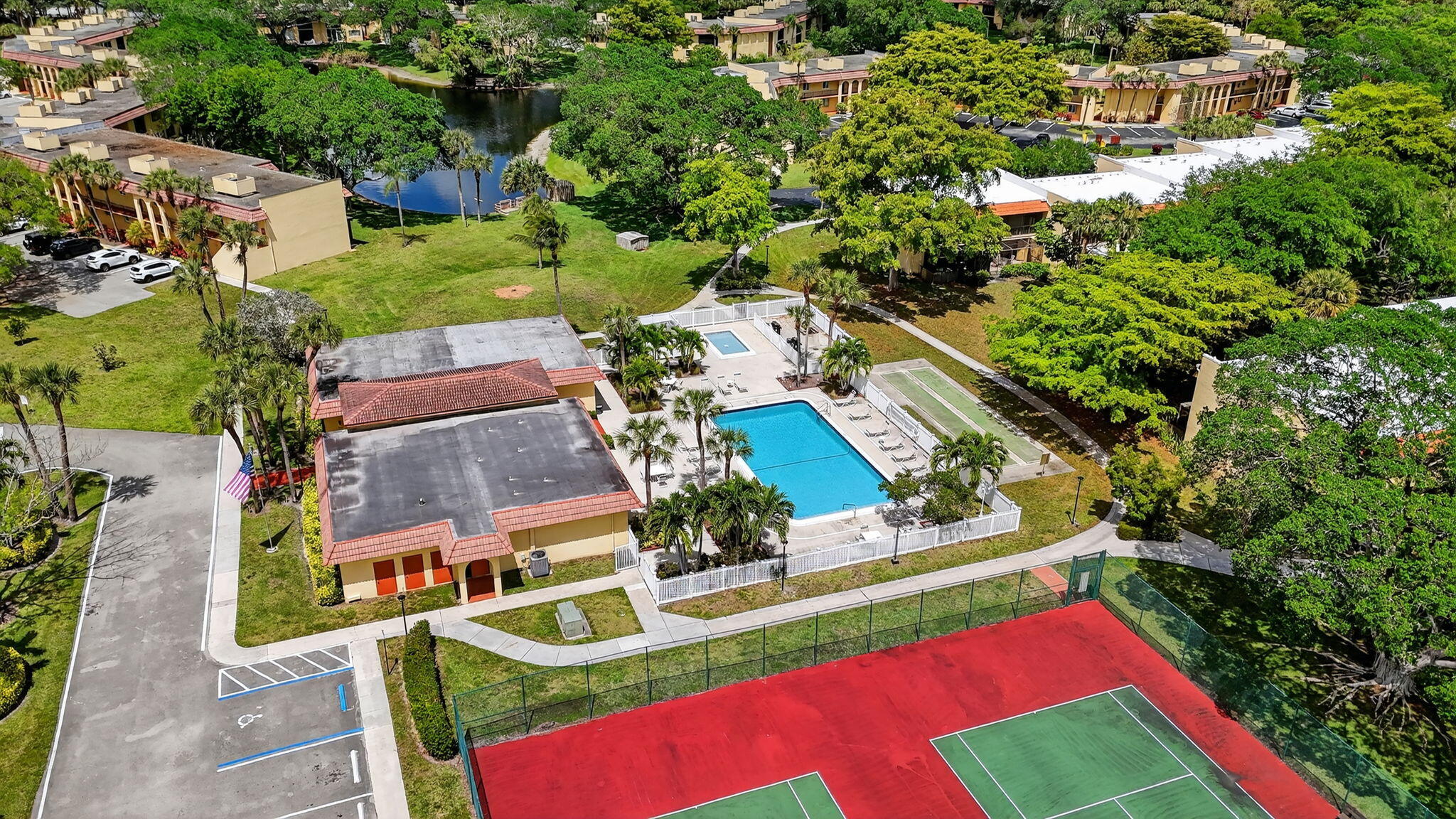 918 Southwest 9th St Circle, Unit 105 Boca Raton, FL 33486 - Photo 36 of 39 an aerial view of house with yard swimming pool and outdoor seating
