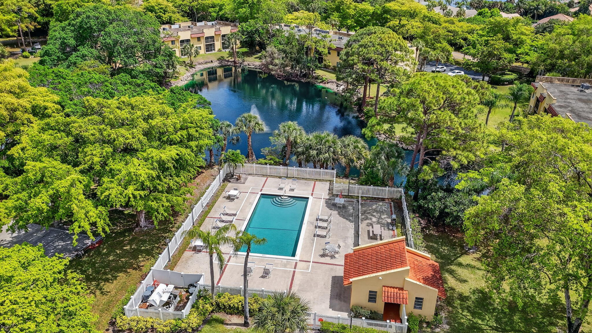 918 Southwest 9th St Circle, Unit 105 Boca Raton, FL 33486 - Photo 38 of 39 an aerial view of a house with swimming pool and outdoor space