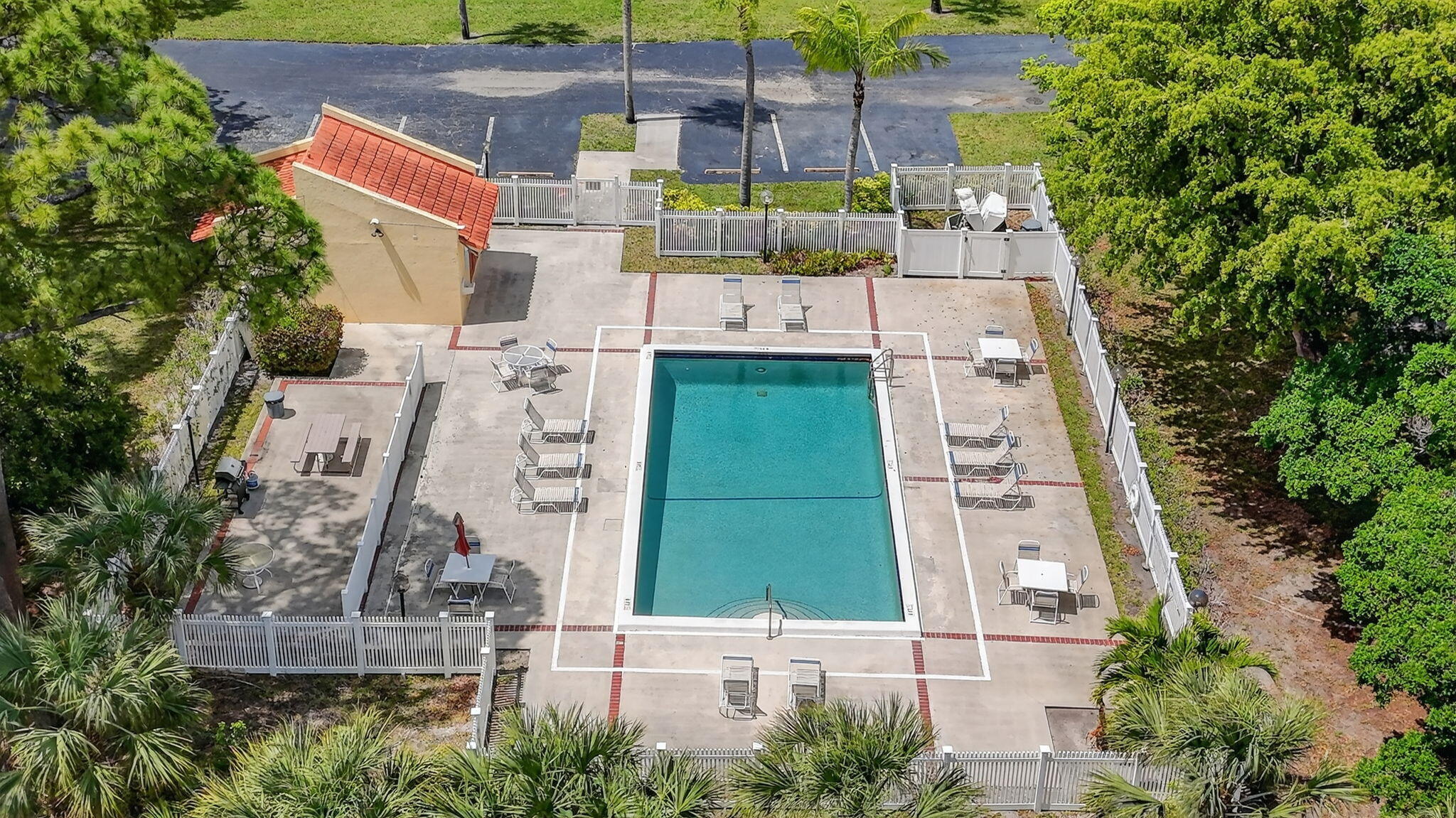 918 Southwest 9th St Circle, Unit 105 Boca Raton, FL 33486 - Photo 39 of 39 an aerial view of a house with a garden and plants