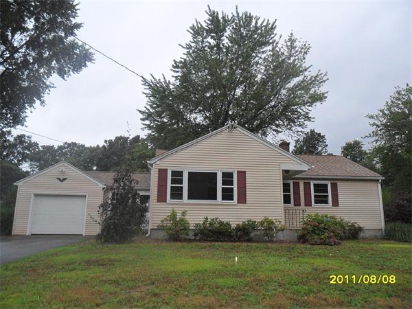 99 Mayher Street Springfield, MA 01104 - Photo 1 of 10 a view of a house with a yard