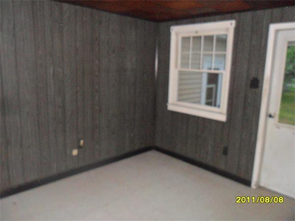 99 Mayher Street Springfield, MA 01104 - Photo 2 of 10 a view of an empty room with a window