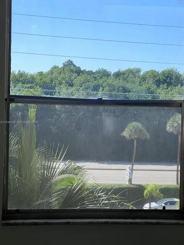 a view of a lake from a balcony