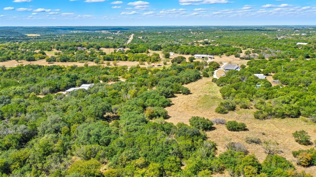 475 Overlook Ridge Bluff Dale, TX 76433 - Photo 12 of 27 a view of a lake with a city