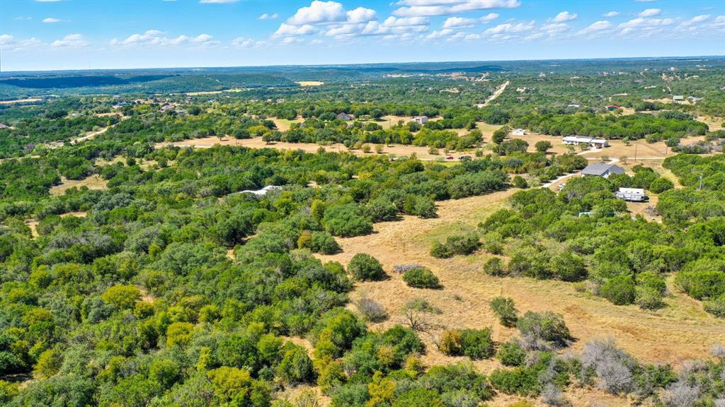 475 Overlook Ridge Bluff Dale, TX 76433 - Photo 14 of 27 a view of a lake with a city