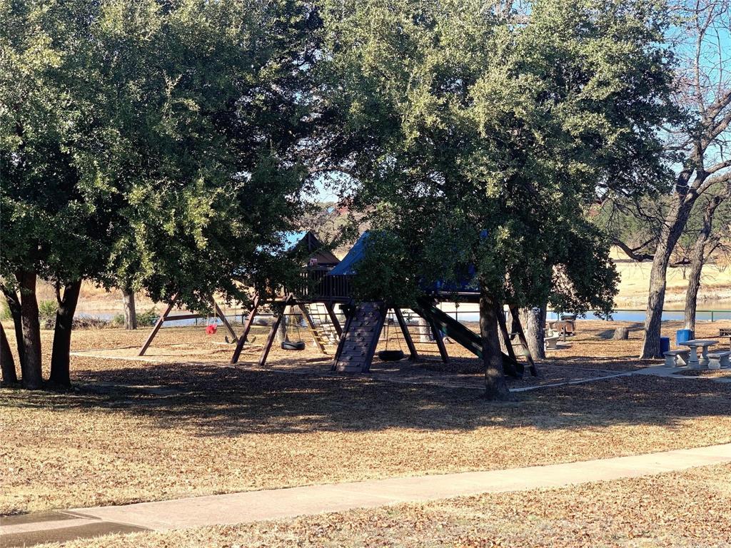 475 Overlook Ridge Bluff Dale, TX 76433 - Photo 25 of 27 a view of a yard covered with snow